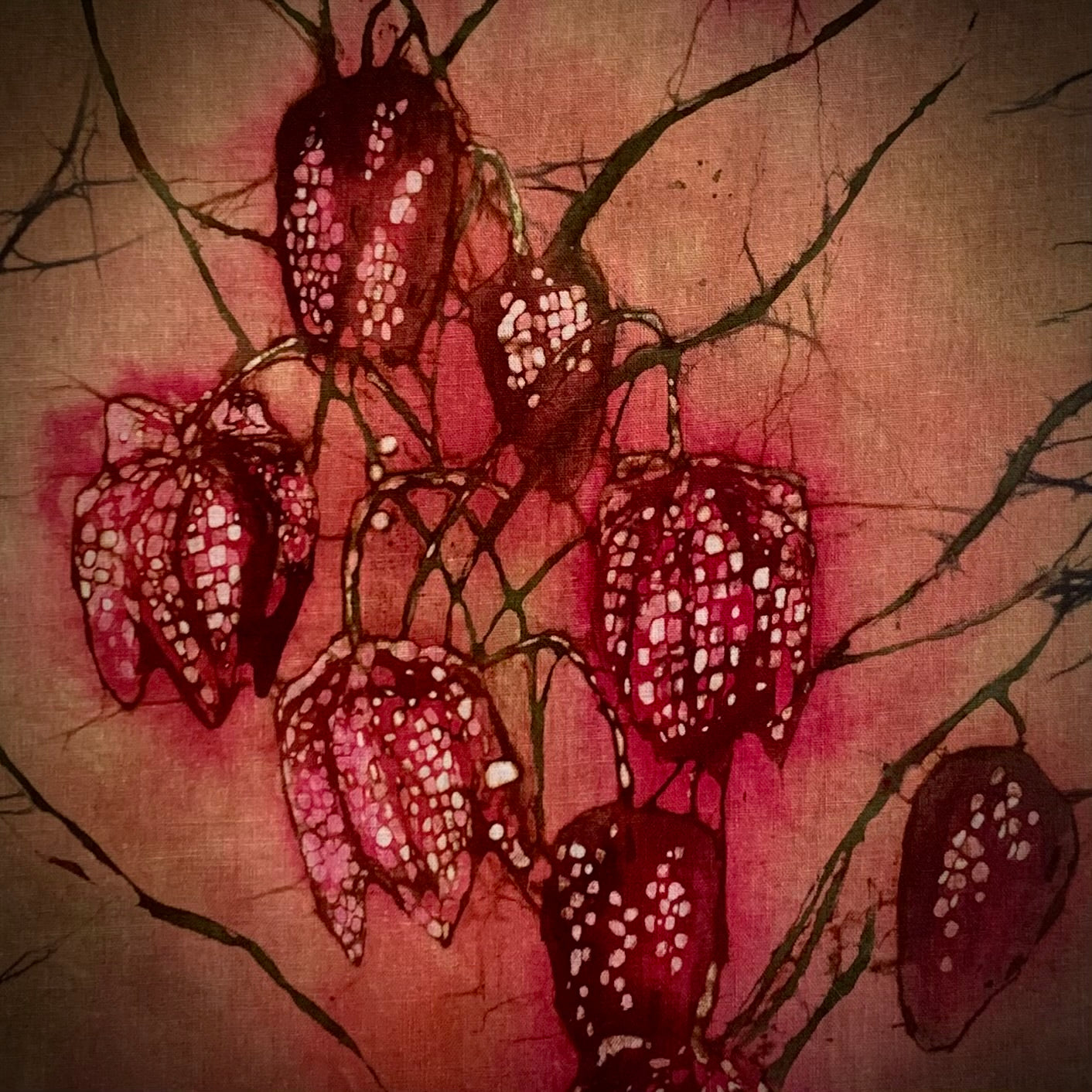 Fritillaria flowers, white and maroon checkered spring blooms. Art form is batik, there are fine hairline cracks made from the art process 